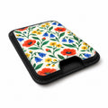 Colorful Wildflower Garden MagSafe Card Holder, angled view showing the thumb access opening