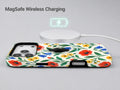 Colorful Wildflower Garden MagSafe Loop Case, shown with a MagSafe wireless charger