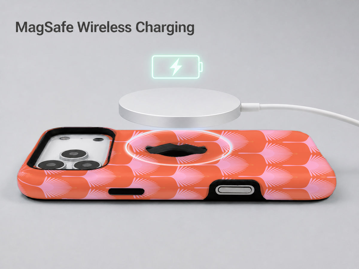 Coral Pink Scallop MagSafe Loop iPhone Case shown with a MagSafe-compatible wireless charger attached