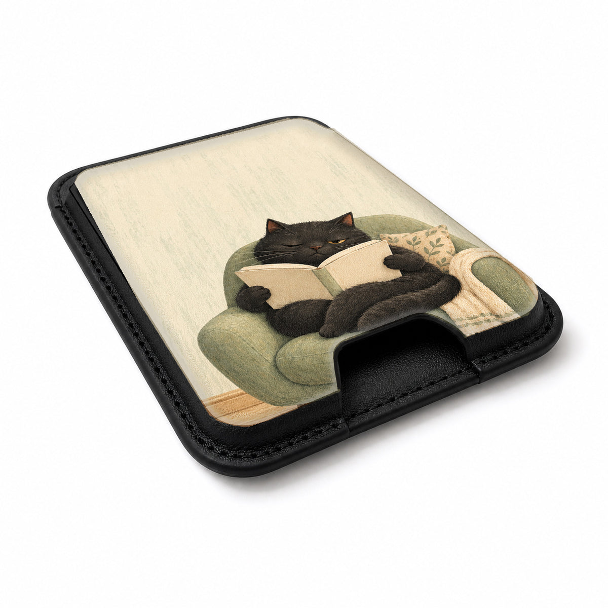 Cozy Reading Black Cat MagSafe Card Holder, angled view showing the thumb access opening