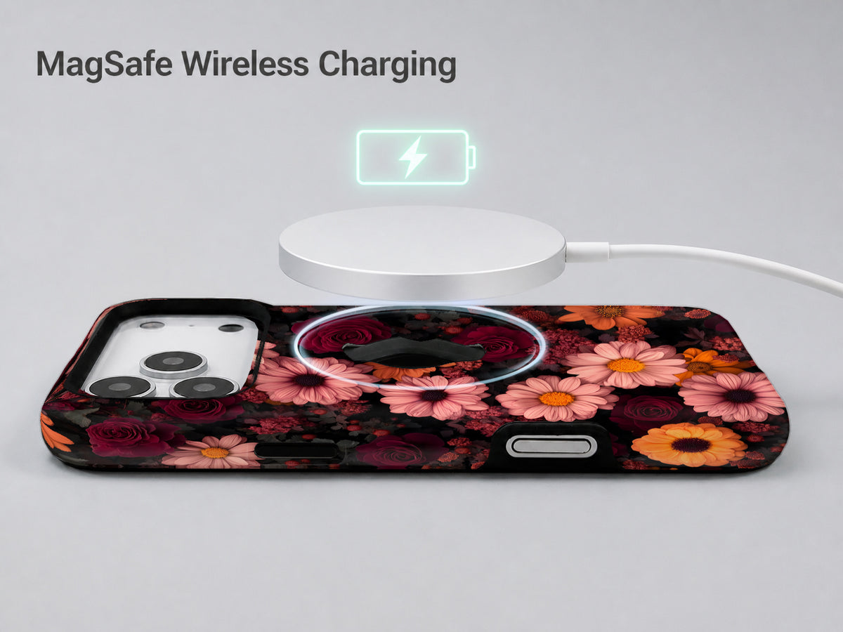 Dark Autumn Daisy Floral MagSafe Loop iPhone Case shown with a MagSafe-compatible wireless charger attached