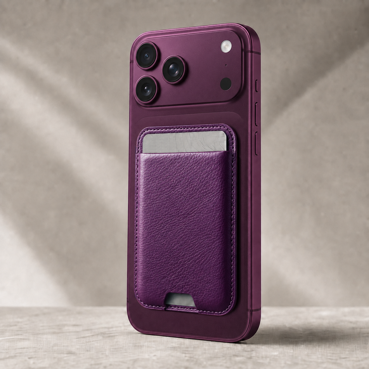 Dark Cherry MagSafe card holder attached to a phone for everyday carry