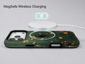Dark Green Golden Wildflower Meadow MagSafe Loop iPhone Case shown with a MagSafe-compatible wireless charger attached