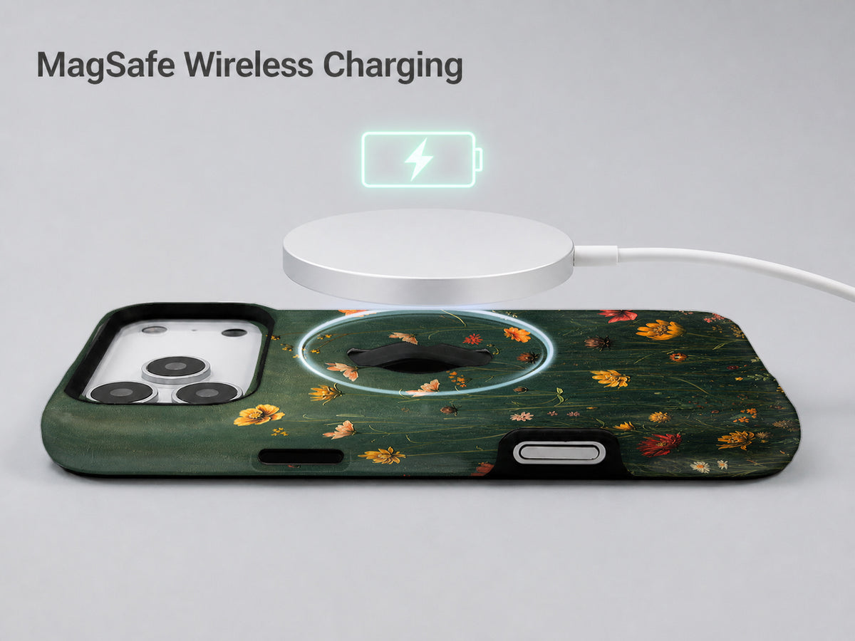 Dark Green Golden Wildflower Meadow MagSafe Loop iPhone Case shown with a MagSafe-compatible wireless charger attached