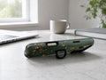 Dark Green Golden Wildflower Meadow MagSafe Loop iPhone Case shown in a neutral white professional lifestyle setting