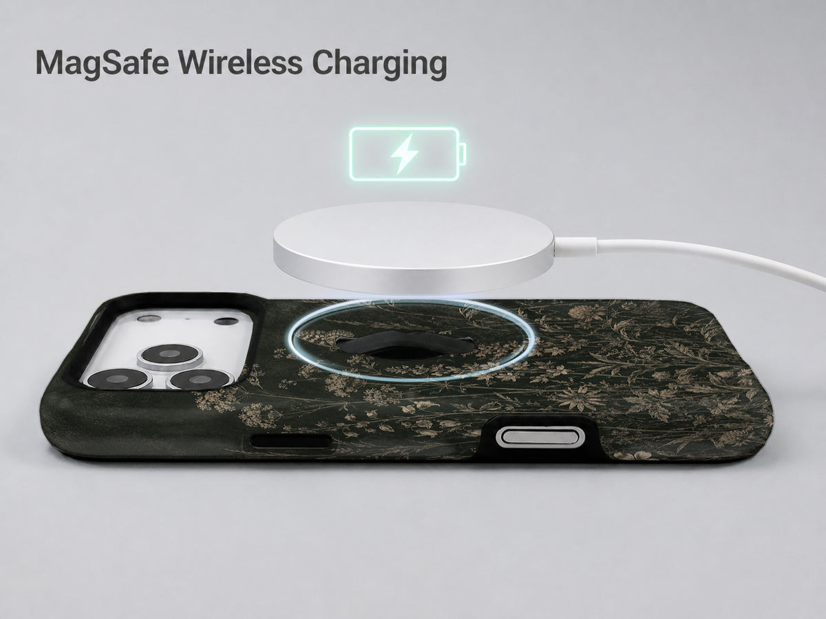 Dark Vintage Botanical MagSafe Loop iPhone Case shown with a MagSafe-compatible wireless charger attached