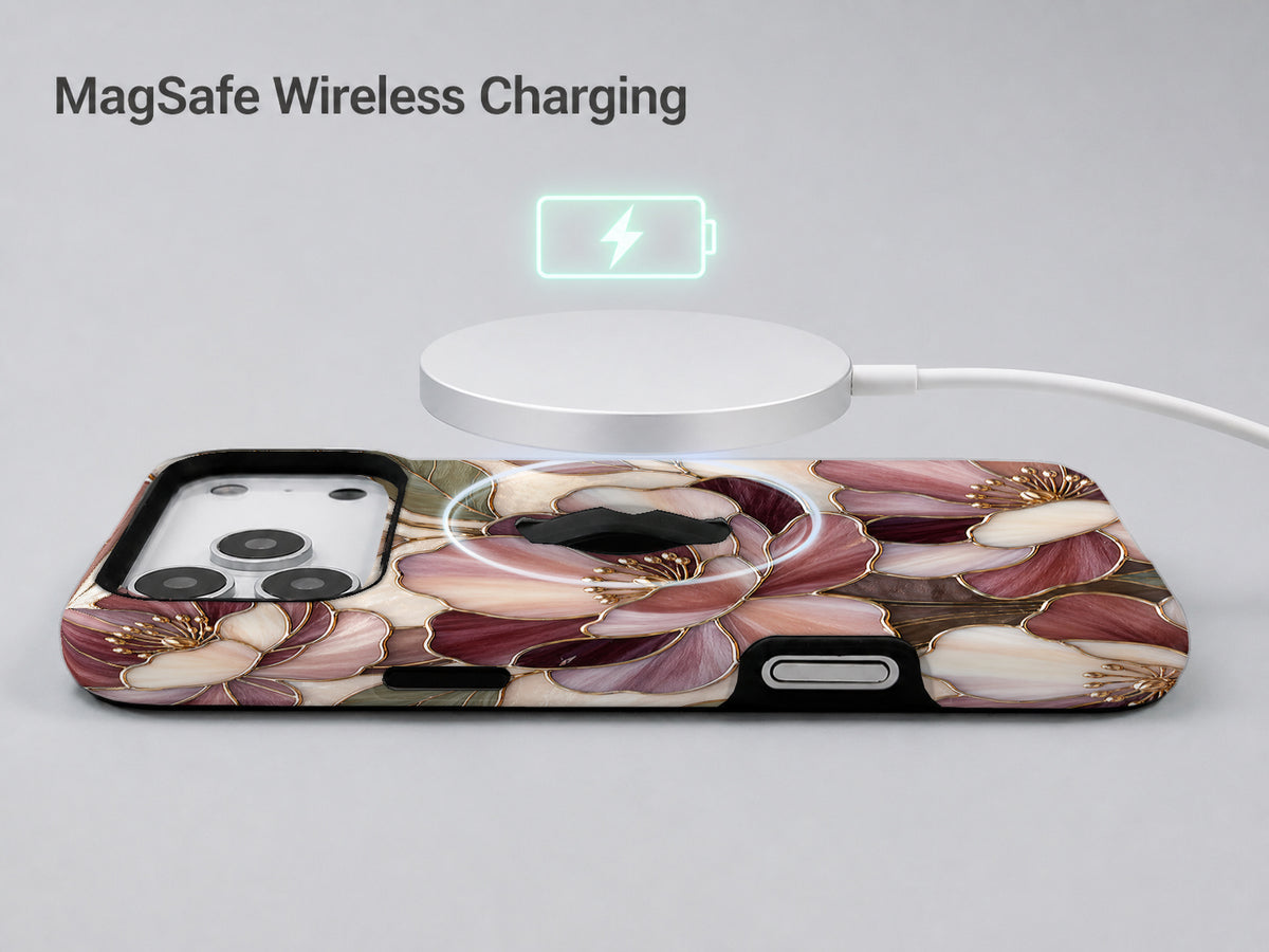 Dusty Rose Magnolia Floral MagSafe Loop iPhone Case shown with a MagSafe-compatible wireless charger attached