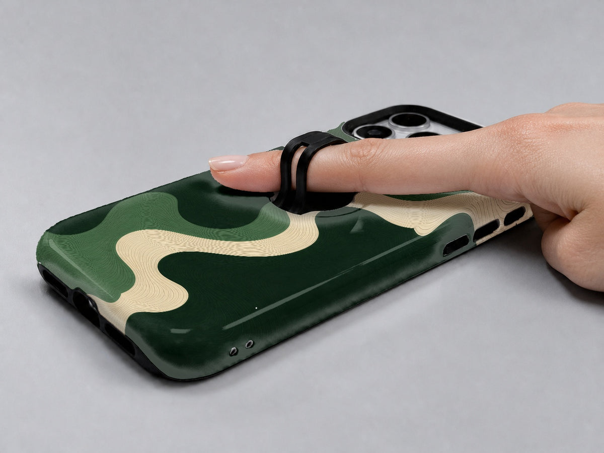Forest Green Abstract Wave MagSafe Loop iPhone Case shown in use with a finger through the horizontal loop
