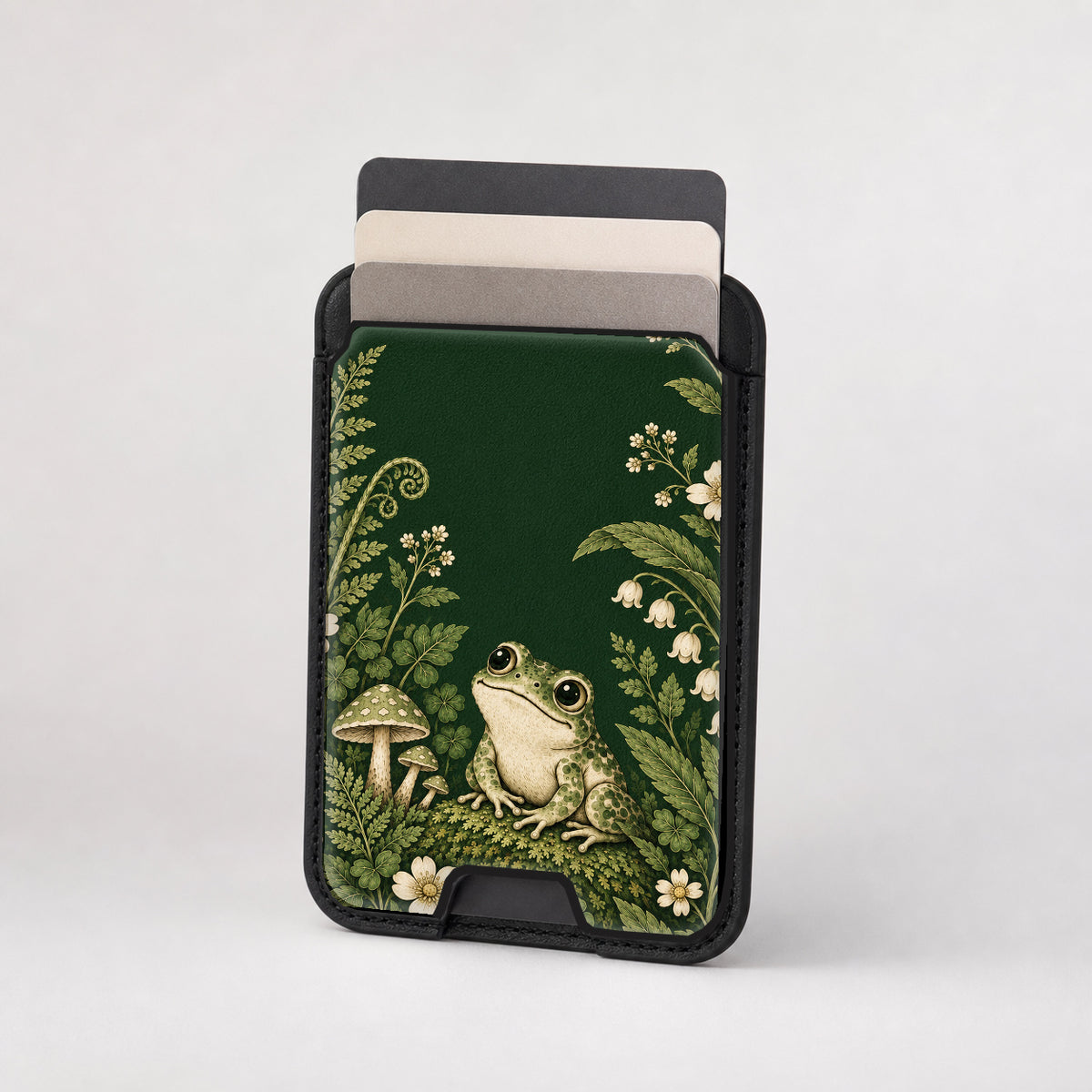 Forest Green Frog and Mushroom Garden MagSafe Card Holder, card storage shown with cards