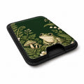Forest Green Frog and Mushroom Garden MagSafe Card Holder, angled view showing the thumb access opening