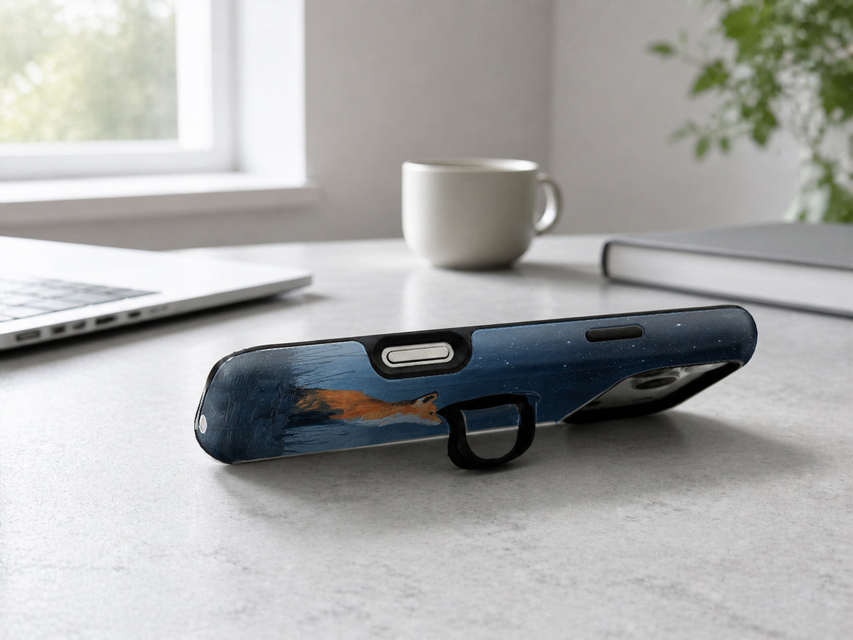 Fox Under Starry Sky MagSafe Loop iPhone Case shown in a neutral white professional lifestyle setting