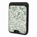 Front view of the Green Toile Botanical MagSafe card holder on a white background