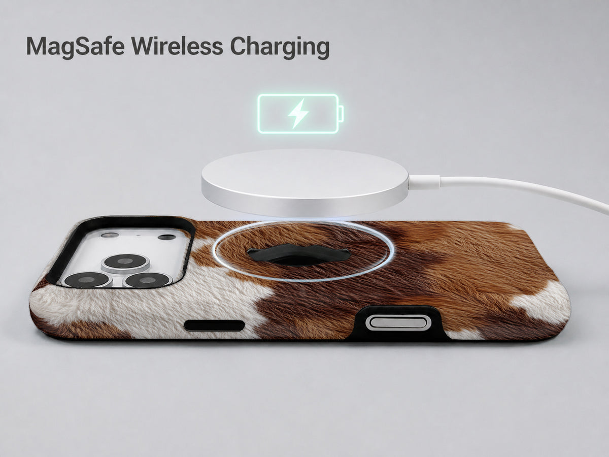 Highland Cowhide Print MagSafe Loop iPhone Case shown with a MagSafe-compatible wireless charger attached
