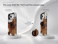 Highland Cowhide Print MagSafe Loop iPhone Case side view showing the built-in finger loop
