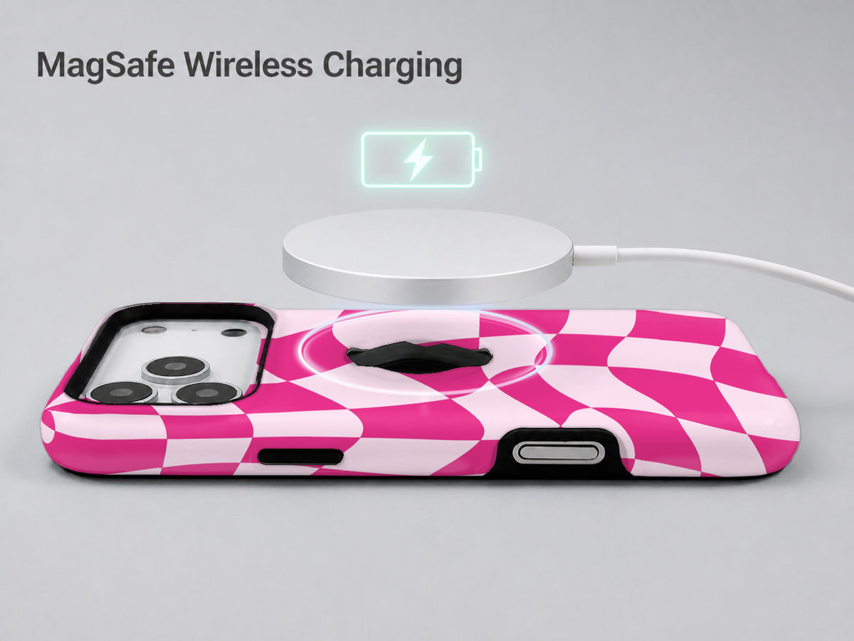 Hot Pink Wavy Checkerboard MagSafe Loop iPhone Case shown with a MagSafe-compatible wireless charger attached