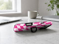Hot Pink Wavy Checkerboard MagSafe Loop iPhone Case shown in a neutral white professional lifestyle setting