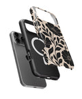 Exploded view of black floral MagSafe iPhone 17 Pro Max tough case with dual-layer protection