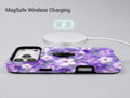 Lavender Daisy Floral MagSafe Loop iPhone Case shown with a MagSafe-compatible wireless charger attached