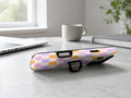 Lavender Peach Checkerboard MagSafe Loop iPhone Case shown in a neutral white professional lifestyle setting