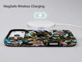 Midnight Ornate Jewel Floral MagSafe Loop iPhone Case shown with a MagSafe-compatible wireless charger attached