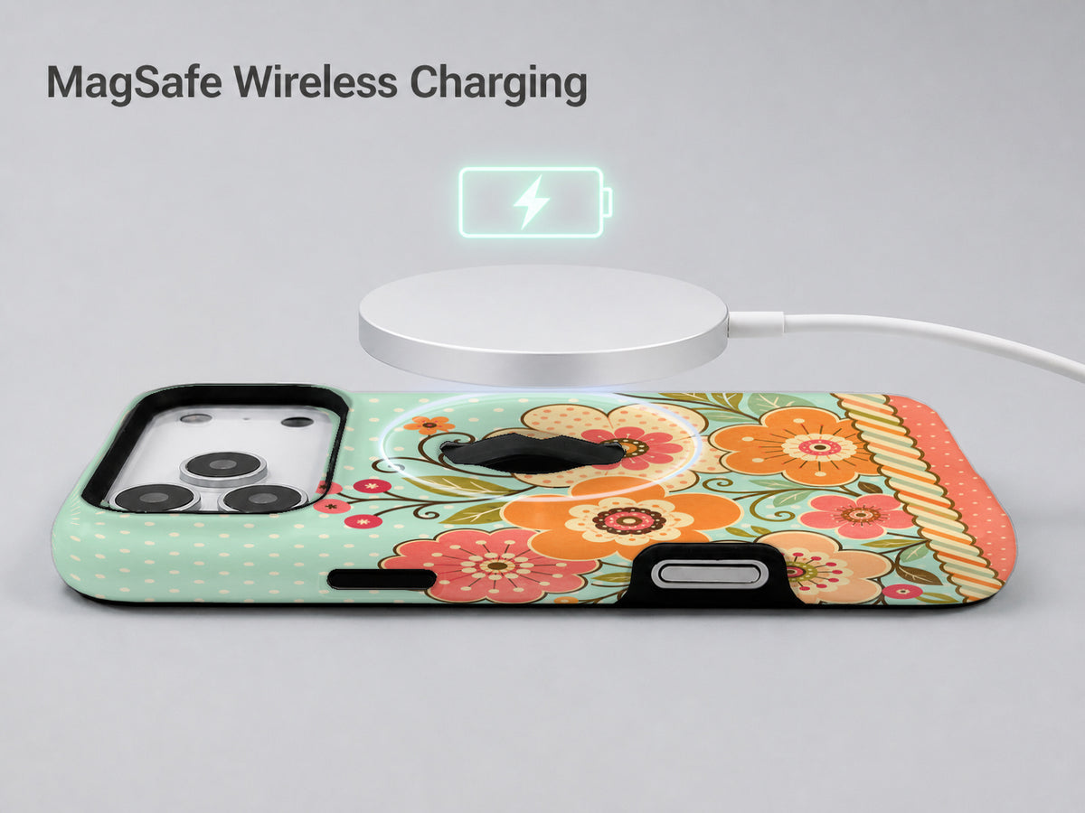 Mint Retro Folk Floral MagSafe Loop iPhone Case shown with a MagSafe-compatible wireless charger attached