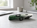 Misty Evergreen Forest MagSafe Loop iPhone Case shown in a neutral white professional lifestyle setting
