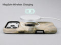 Misty Neutral Landscape MagSafe Loop iPhone Case shown with a MagSafe-compatible wireless charger attached
