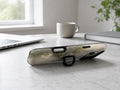 Misty Neutral Landscape MagSafe Loop iPhone Case shown in a neutral white professional lifestyle setting