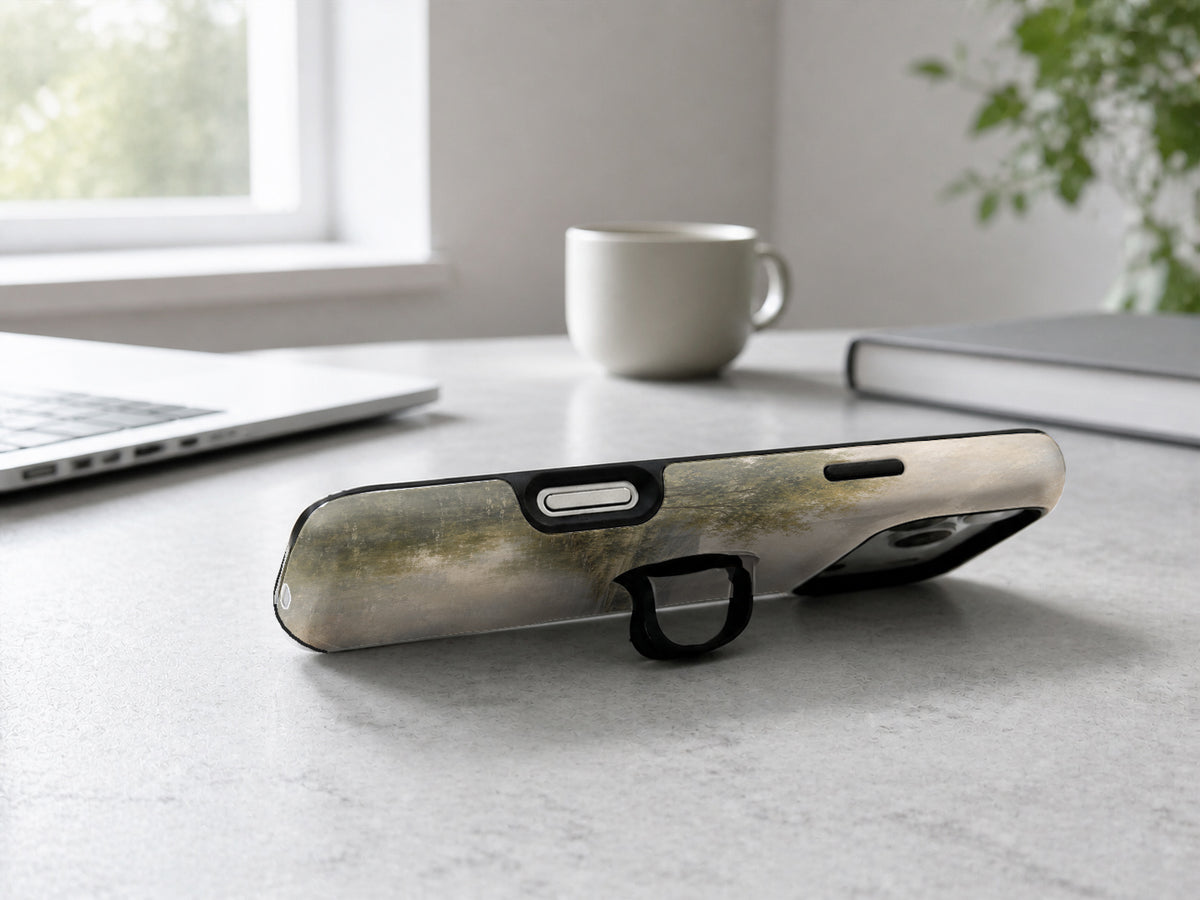 Misty Neutral Landscape MagSafe Loop iPhone Case shown in a neutral white professional lifestyle setting