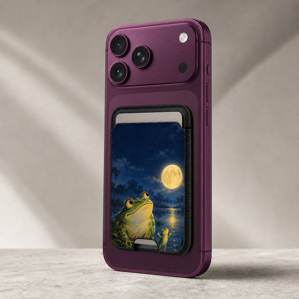 Moonlit Frog by the Lake MagSafe Card Holder, attached to a compatible phone