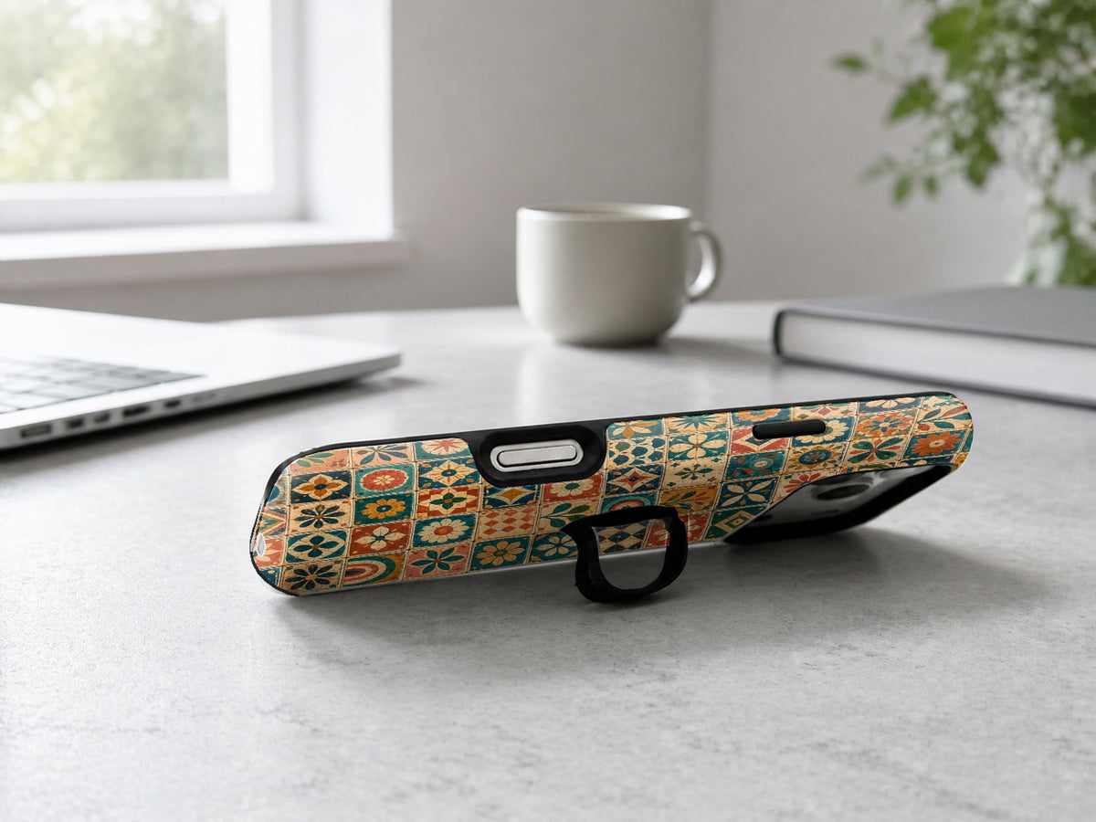 Moroccan Mosaic Tile MagSafe Loop iPhone Case shown in a neutral white professional lifestyle setting