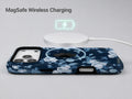 Navy Blue Rose Floral MagSafe Loop iPhone Case shown with a MagSafe-compatible wireless charger attached