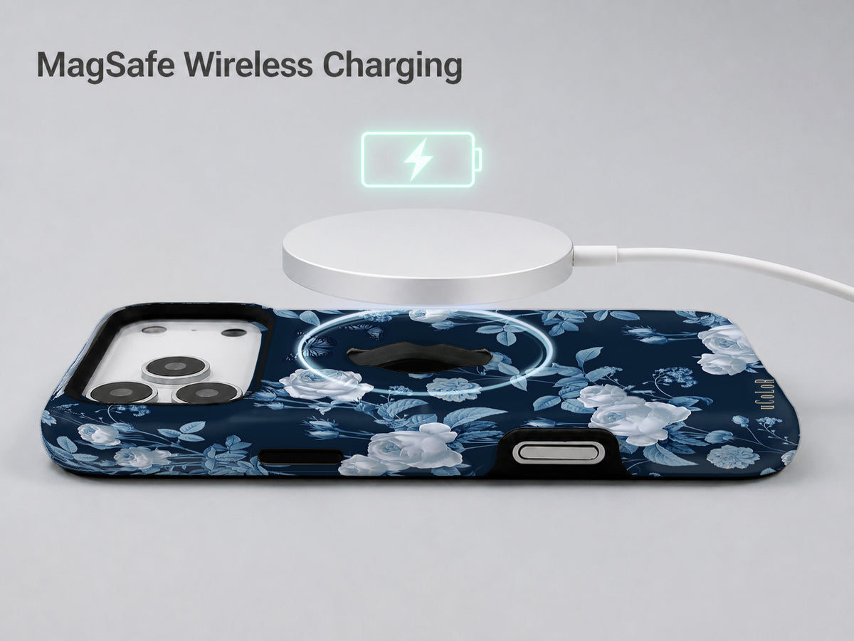 Navy Blue Rose Floral MagSafe Loop iPhone Case shown with a MagSafe-compatible wireless charger attached