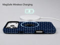 Navy Mini Polka Dot MagSafe Loop iPhone Case shown with a MagSafe-compatible wireless charger attached