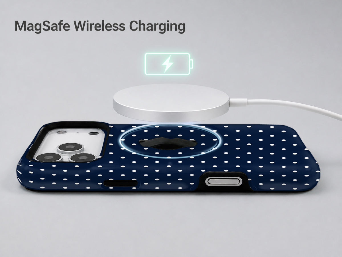 Navy Mini Polka Dot MagSafe Loop iPhone Case shown with a MagSafe-compatible wireless charger attached