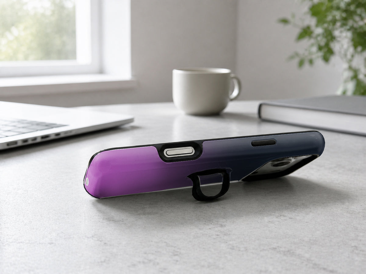 Navy Purple Ombre Gradient MagSafe Loop iPhone Case shown in a neutral white professional lifestyle setting