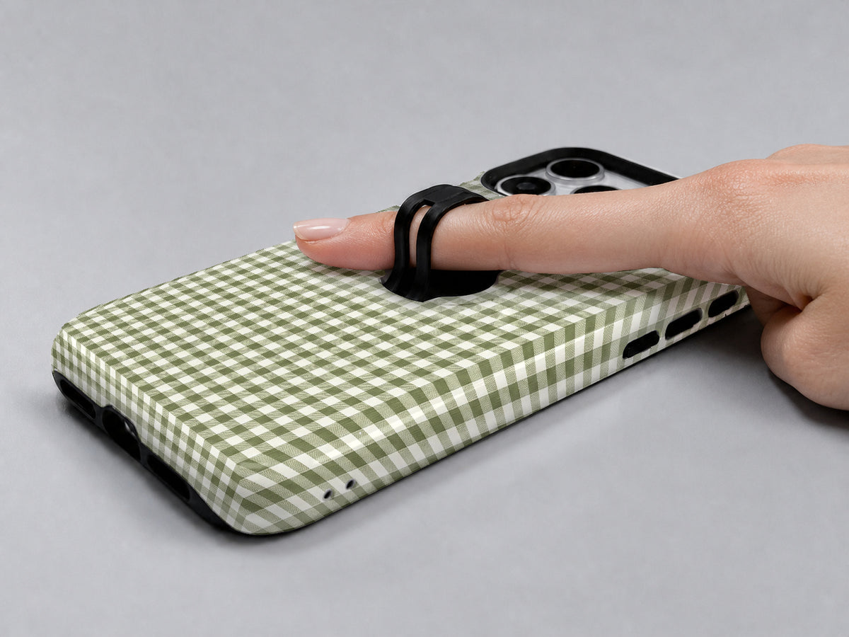 Olive Green and White Gingham MagSafe Loop Case, shown with a finger through the loop