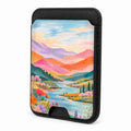 Front view of the Pastel Painted Meadow Landscape MagSafe card holder on a white background