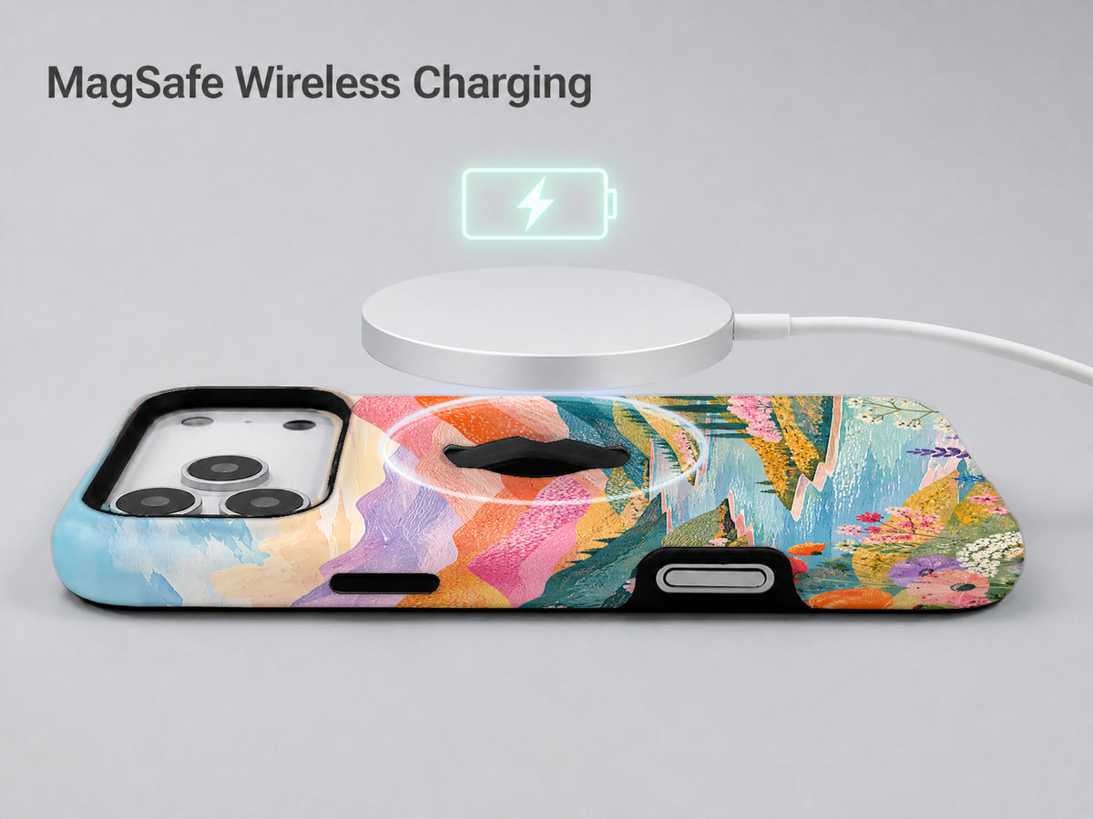 Pastel Painted Meadow Landscape MagSafe Loop iPhone Case shown with a MagSafe-compatible wireless charger attached