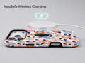 Peach Blue Abstract Leopard MagSafe Loop iPhone Case shown with a MagSafe-compatible wireless charger attached