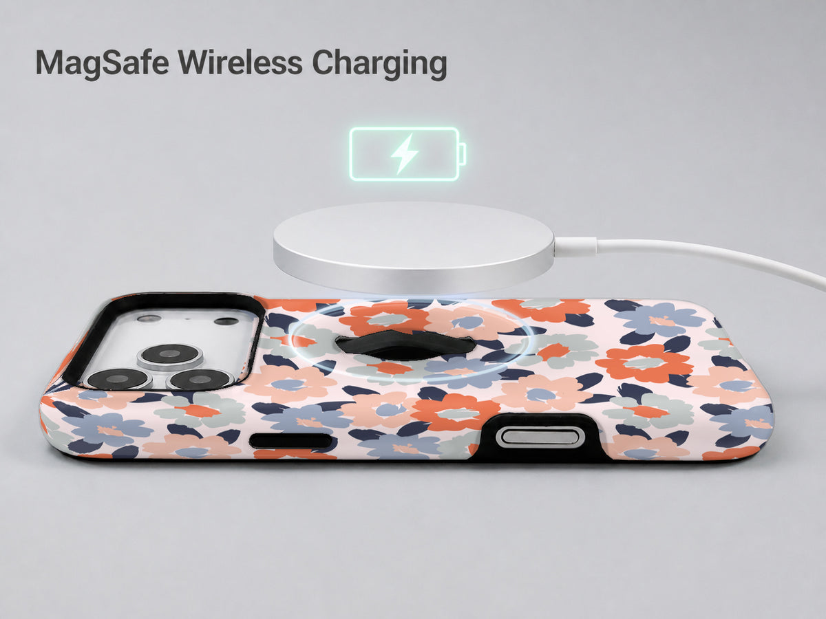 Peach Blue Abstract Leopard MagSafe Loop iPhone Case shown with a MagSafe-compatible wireless charger attached