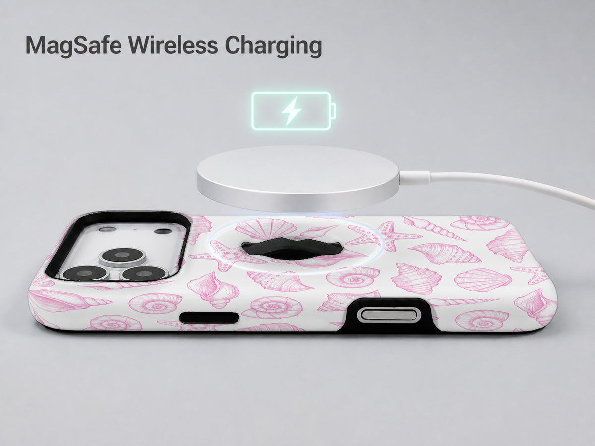 Pink Coastal Seashell MagSafe Loop iPhone Case shown with a MagSafe-compatible wireless charger attached