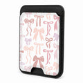 Front view of the Pink Coquette Bow Toile MagSafe card holder on a white background