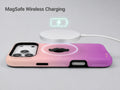 Pink Purple Ombre Gradient MagSafe Loop iPhone Case shown with a MagSafe-compatible wireless charger attached