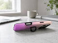 Pink Purple Ombre Gradient MagSafe Loop iPhone Case shown in a neutral white professional lifestyle setting