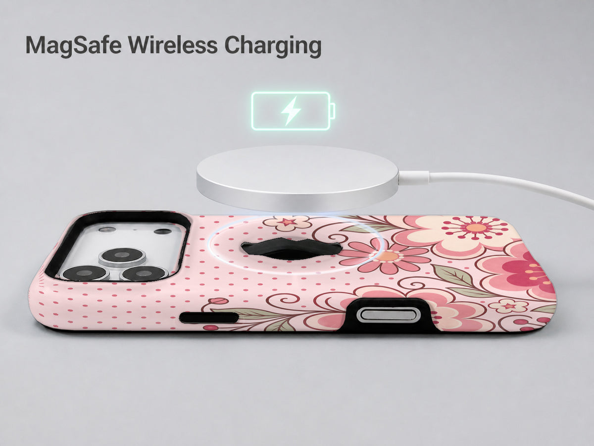 Pink Retro Doodle Floral MagSafe Loop iPhone Case shown with a MagSafe-compatible wireless charger attached
