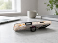 Pressed Wildflower Bouquet MagSafe Loop iPhone Case shown in a neutral white professional lifestyle setting