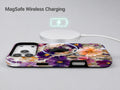 Purple Wildflower Glass Garden MagSafe Loop iPhone Case shown with a MagSafe-compatible wireless charger attached