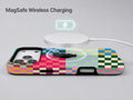 Rainbow Checkerboard Patchwork MagSafe Loop iPhone Case shown with a MagSafe-compatible wireless charger attached