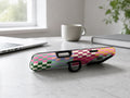 Rainbow Checkerboard Patchwork MagSafe Loop iPhone Case shown in a neutral white professional lifestyle setting